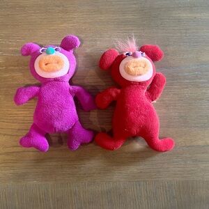 Vibrant Red and Pink Stuffed Animal Duo